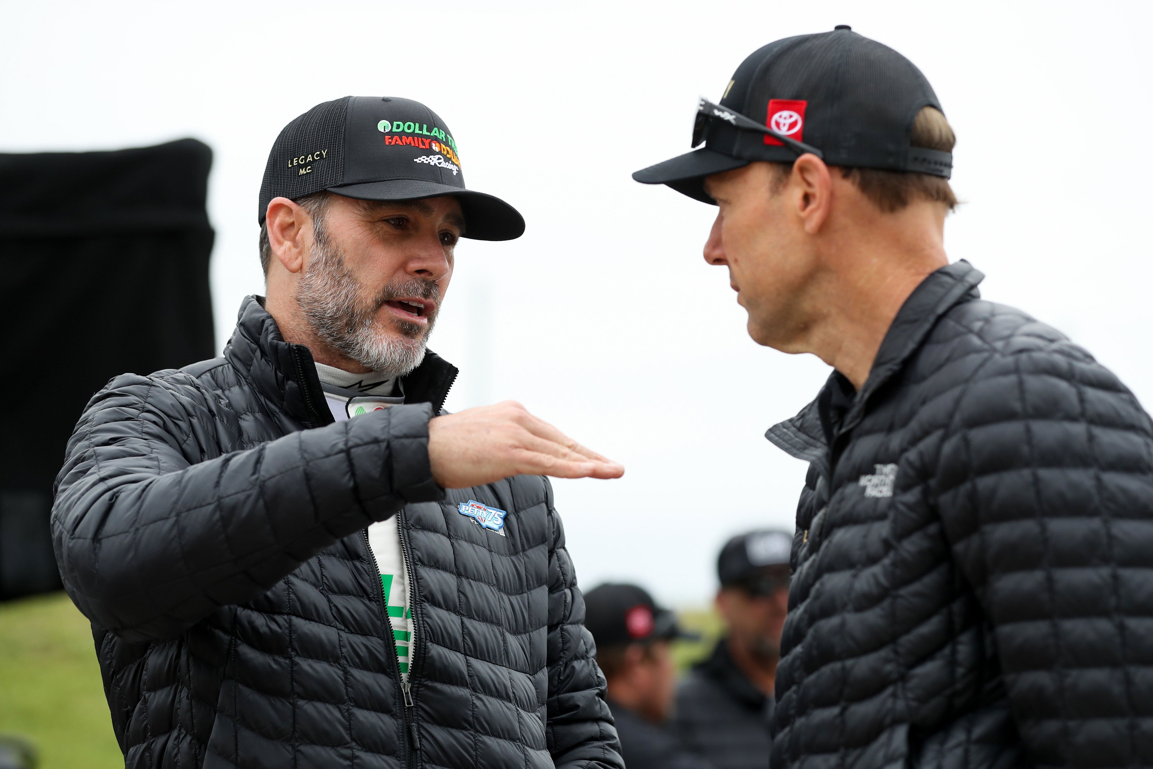 Legacy Motor Club co-owner Jimmie Johnson chats with Matt Kenseth during the Wurth 400. Source: Imagn